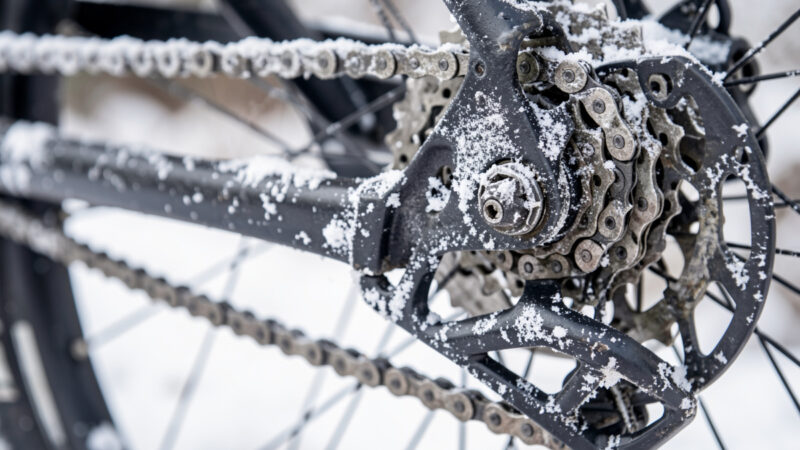 Salt-crusted e-bike chain and derailleur after a winter ride